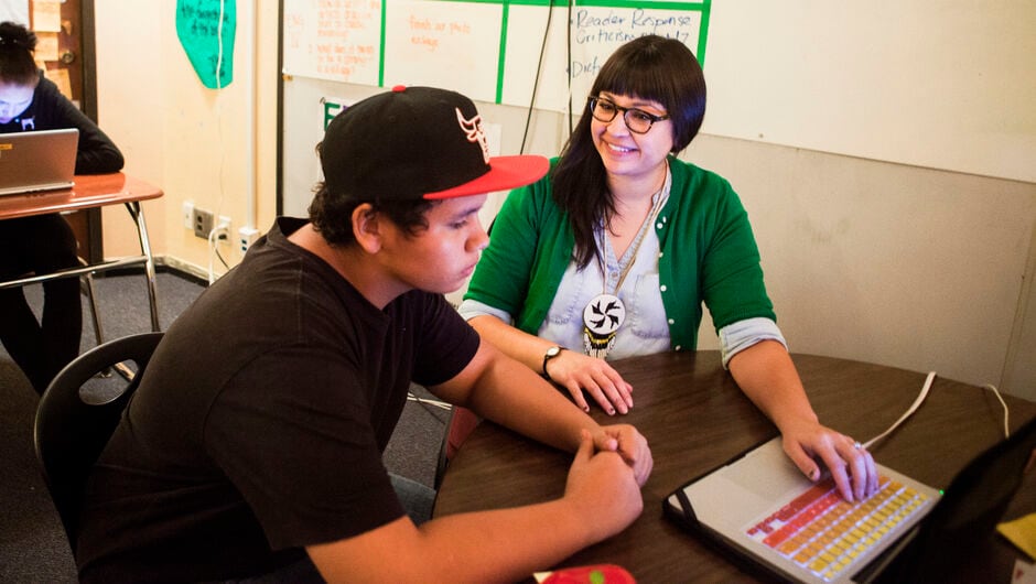 Student and teacher sitting in the classroom