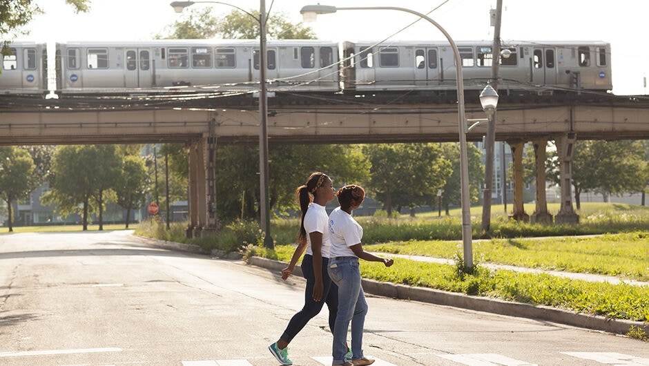 Two Women Walking by A Subway in Chicago