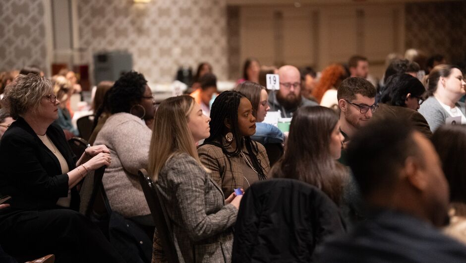 A group of people at a conference.