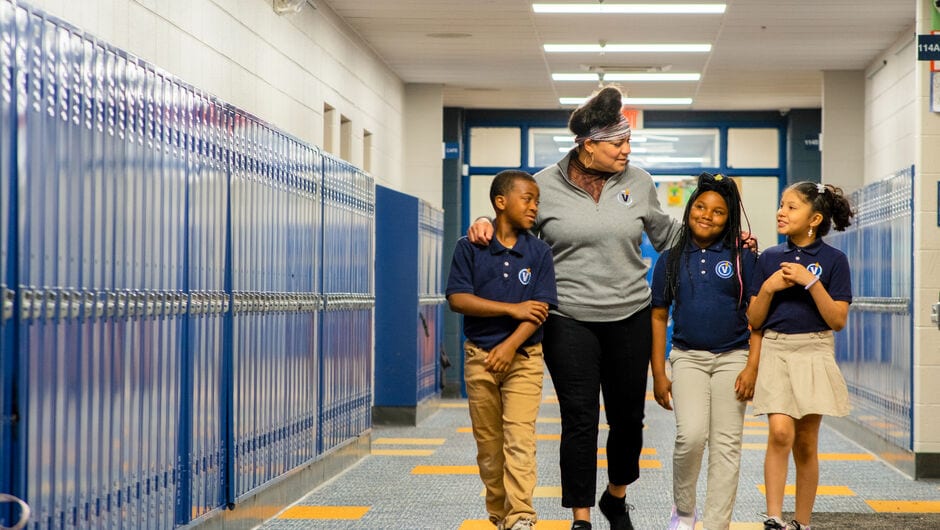 Teacher with students