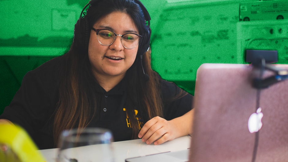 Teacher in front of laptop for remote learning