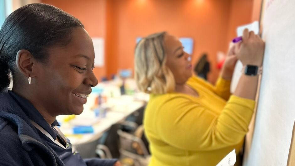 Teachers participating in a professional development workshop.