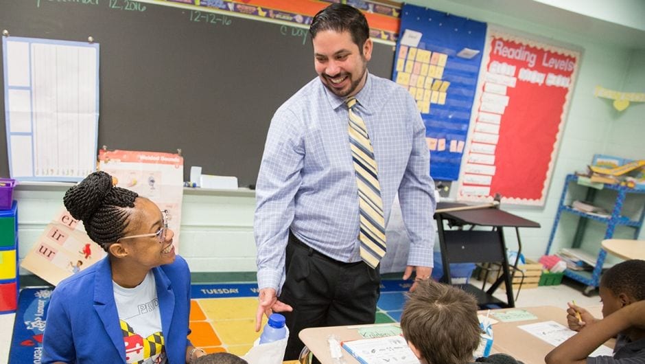 Principal Jammal with Jasmine Owens in classroom with students