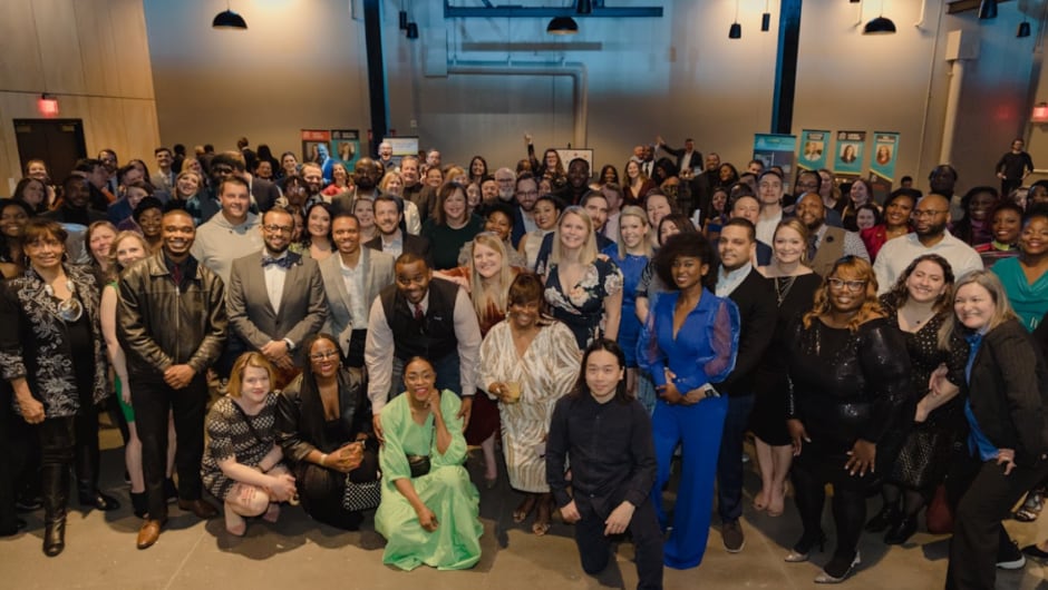 Alt text: St. Louis community members gather at an event.