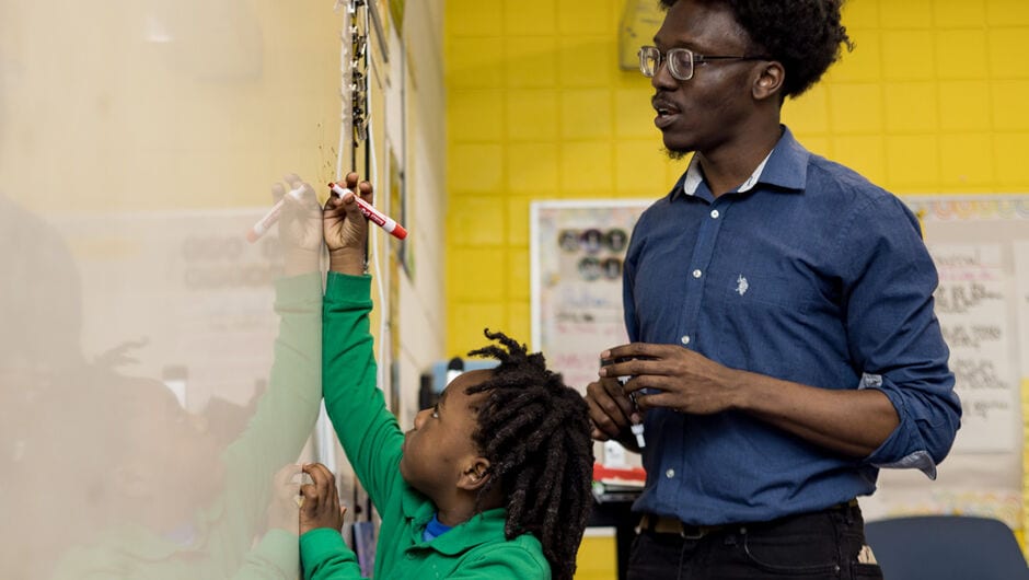 Teach helping student